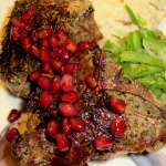 Herb crusted lamb with red wine and pomegrante sause small e